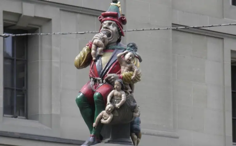 Statue of a giant who eats a child