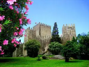 Guimarães Castle with green lawn outside