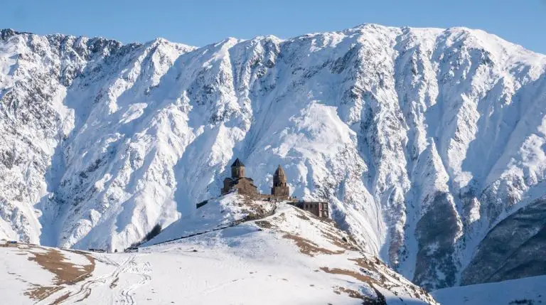 Gergeti church in winter in Stepantsminda