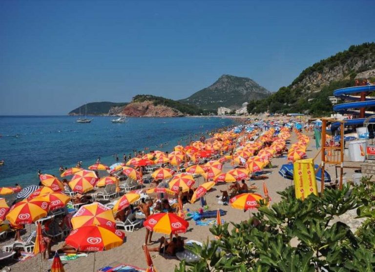 Sunbeds with umbrellas on Sutomore
