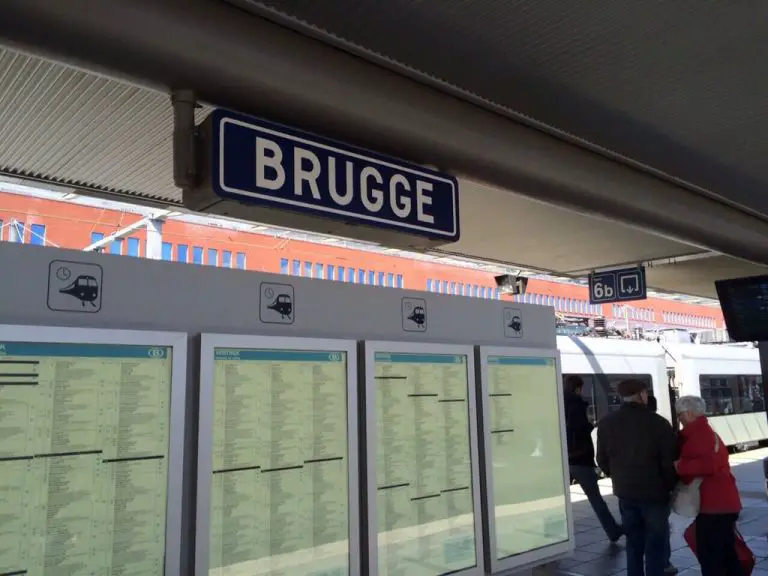 On the platform of a train station in Bruges