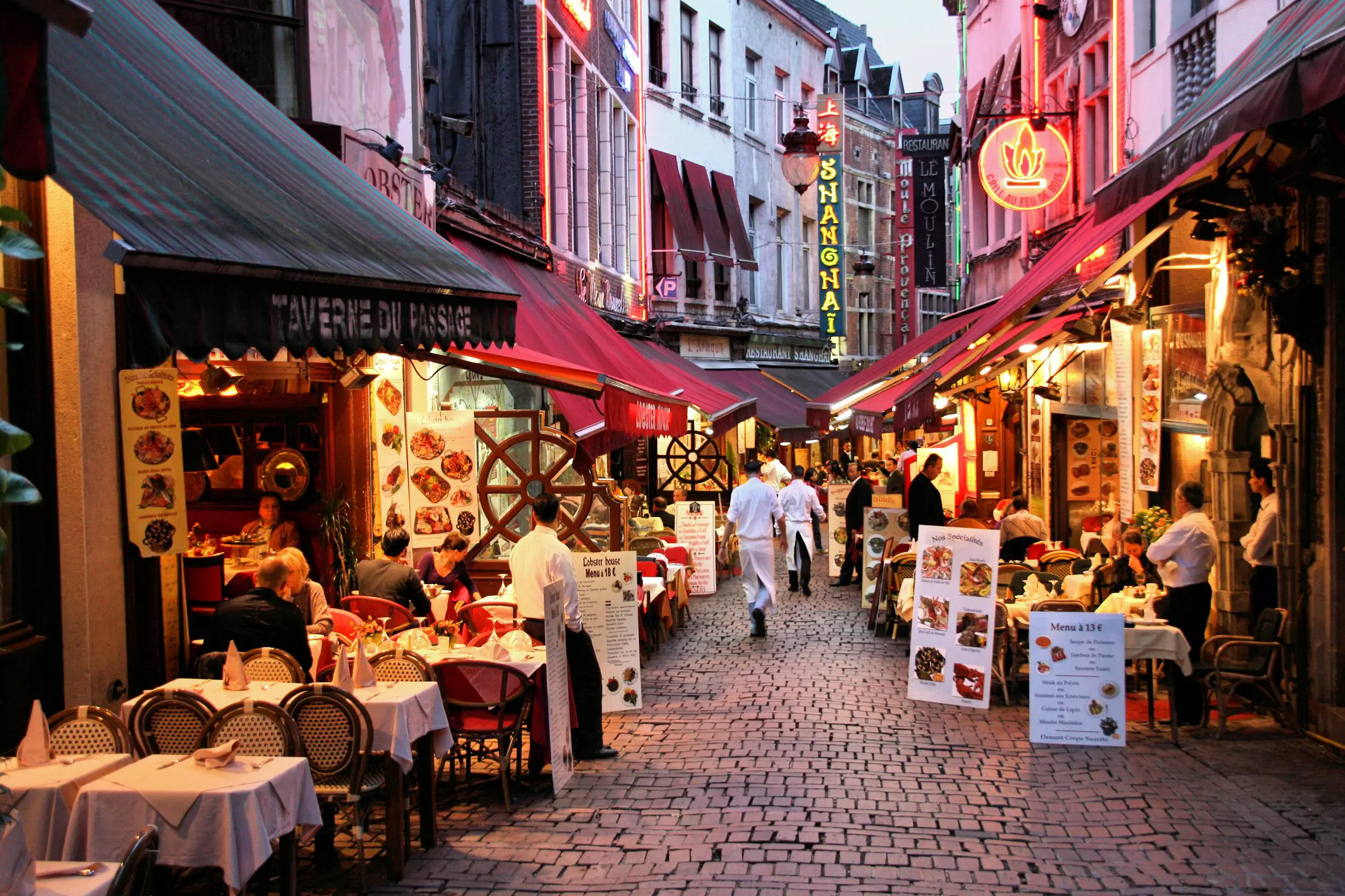Typical scene in a street full of restaurants in Brussels